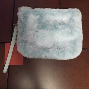 Light blue faux fur wristlet new with tags